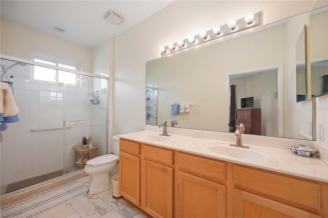 4209 Cascade Falls Dr, Sarasota, FL 34243 - full bath with double vanity, a stall shower, toilet, and marble look tiles