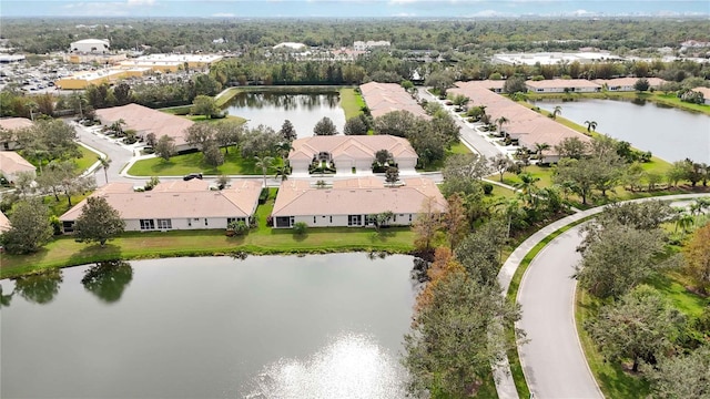 drone / aerial view with a water view