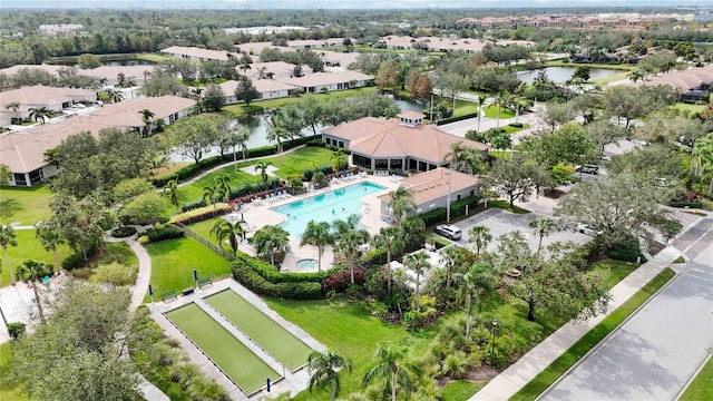 4209 Cascade Falls Dr, Sarasota, FL 34243 - aerial perspective of suburban area with a pool and a large body of water