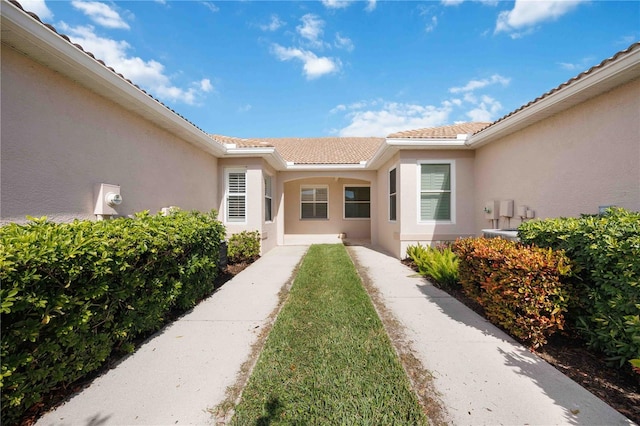 4209 Cascade Falls Dr, Sarasota, FL 34243 - property entrance featuring stucco siding