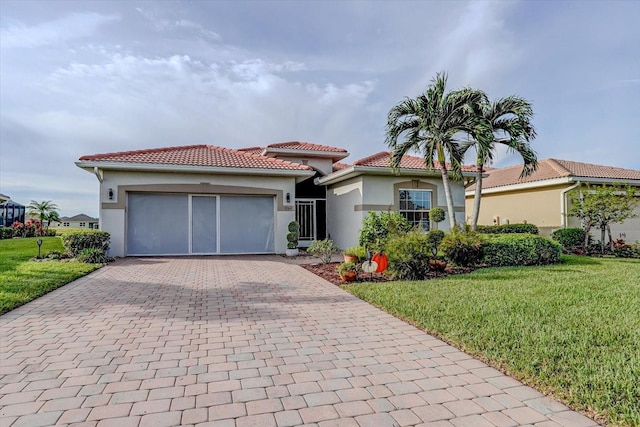 mediterranean / spanish-style house with a front lawn and a garage