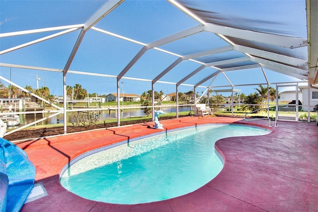 view of pool with a patio, a water view, and glass enclosure