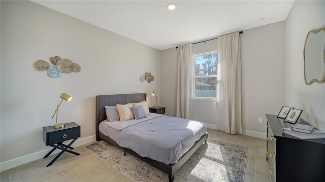 bedroom with light hardwood / wood-style floors