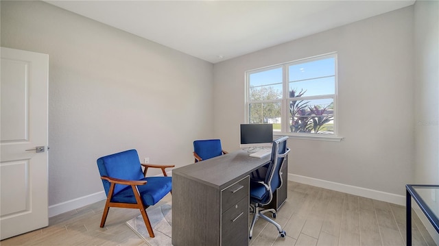 home office featuring light hardwood / wood-style flooring