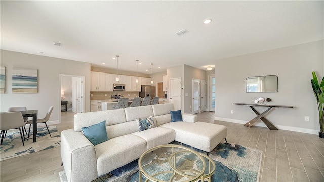 living room featuring light hardwood / wood-style floors