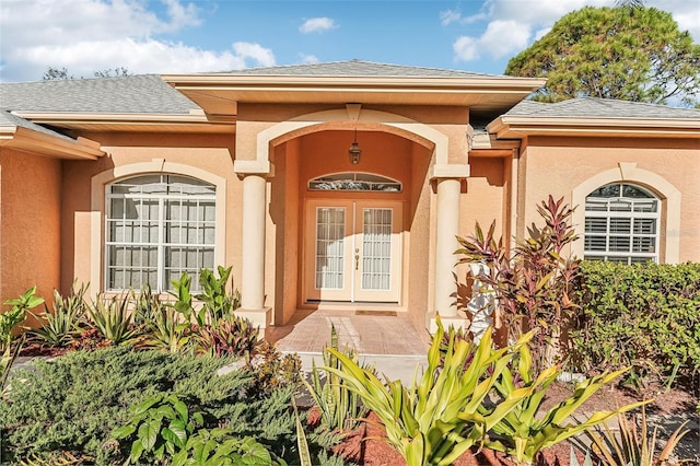 entrance to property featuring french doors