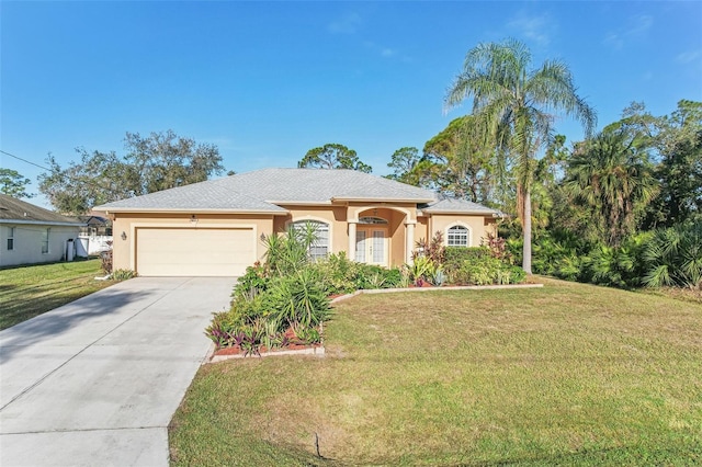 single story home with a garage and a front lawn