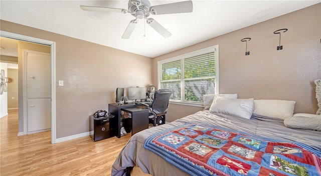 bedroom featuring ceiling fan and light wood-type flooring