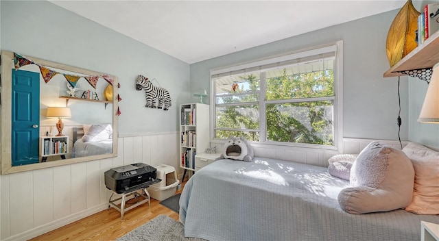 bedroom with light hardwood / wood-style flooring