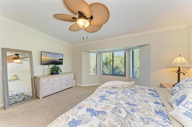 carpeted bedroom featuring vaulted ceiling, ornamental molding, and ceiling fan