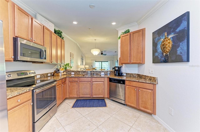 kitchen with sink, light tile patterned floors, appliances with stainless steel finishes, hanging light fixtures, and ornamental molding