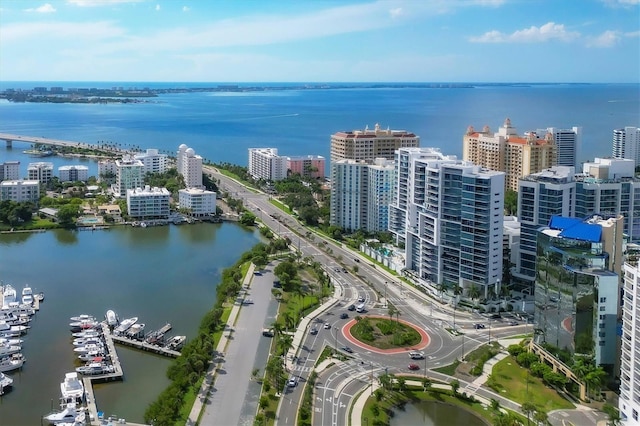 birds eye view of property featuring a water view