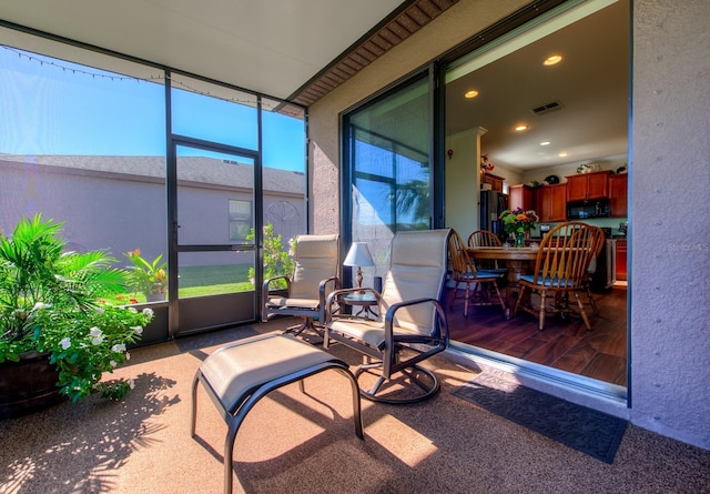 sunroom / solarium with visible vents