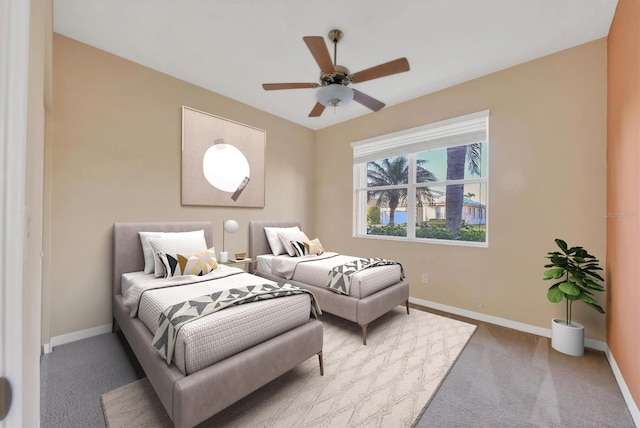 bedroom featuring ceiling fan and carpet floors