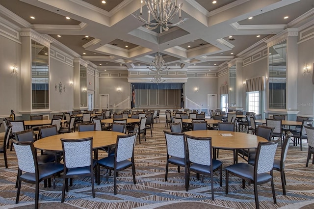 carpeted dining area featuring a high ceiling, coffered ceiling, crown molding, beamed ceiling, and a chandelier