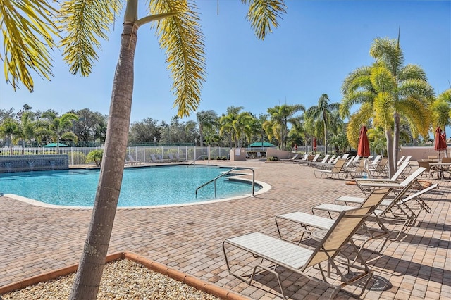 view of swimming pool featuring a patio area