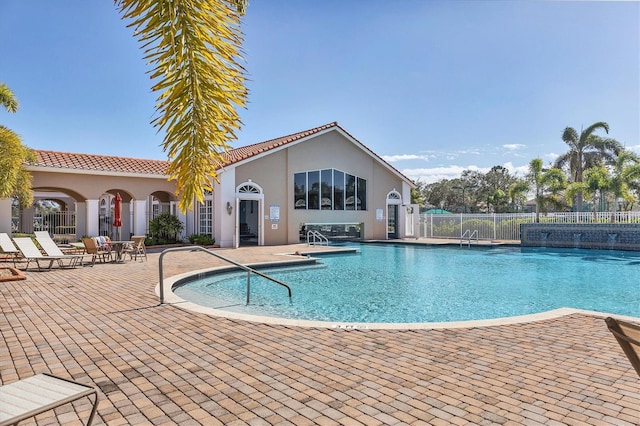 view of pool featuring a patio