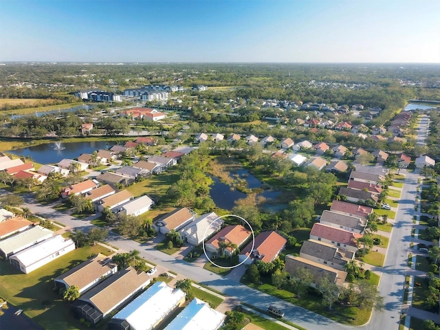 drone / aerial view featuring a water view