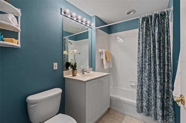 full bathroom with shower / bath combo, vanity, tile patterned flooring, toilet, and a textured ceiling