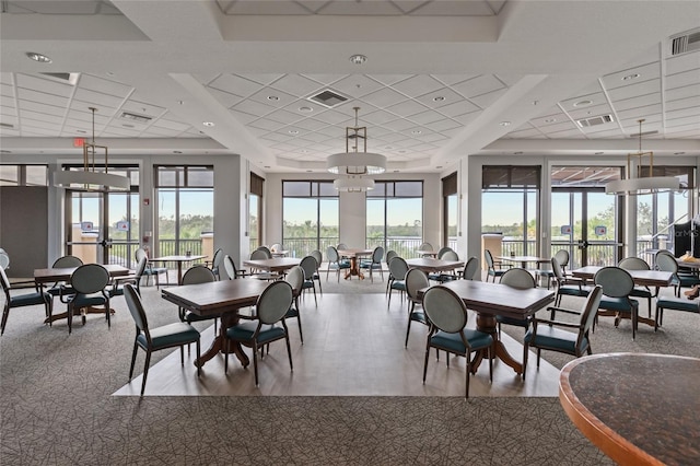 dining space featuring hardwood / wood-style floors