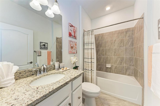 full bathroom featuring tile patterned flooring, vanity, shower / bath combination with curtain, and toilet