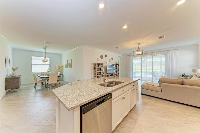 kitchen featuring dishwasher, sink, hanging light fixtures, an island with sink, and white cabinetry