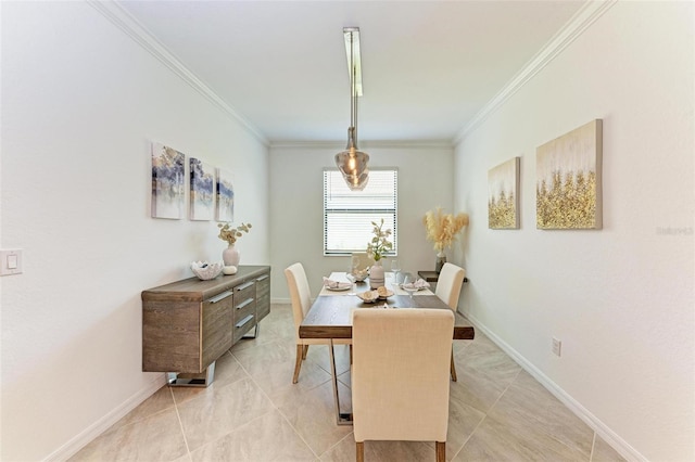 dining space featuring ornamental molding