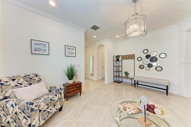 living area with a chandelier and ornamental molding