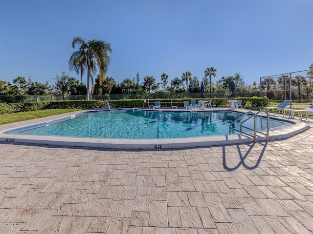 view of swimming pool featuring a patio