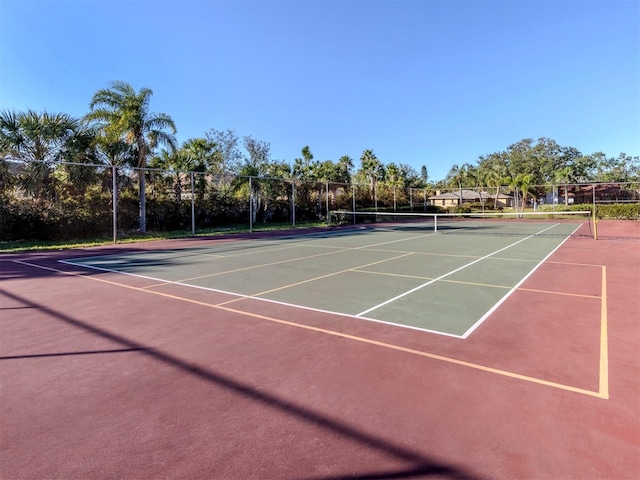 view of sport court with basketball hoop