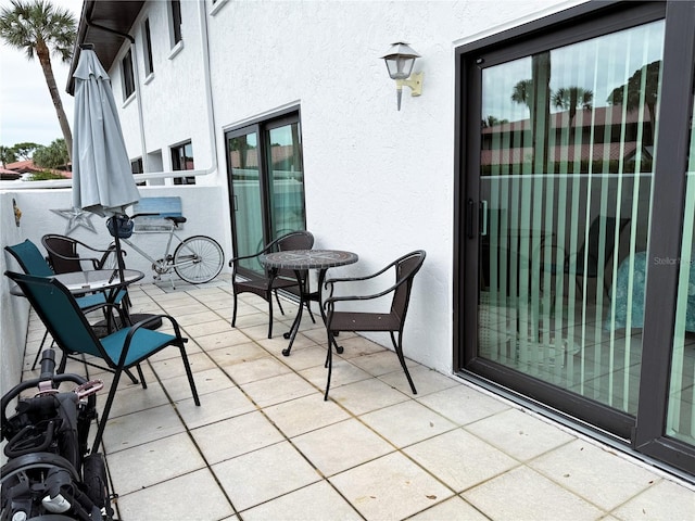 balcony featuring a patio area