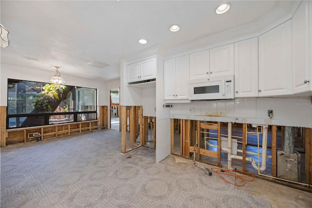 kitchen with white cabinets