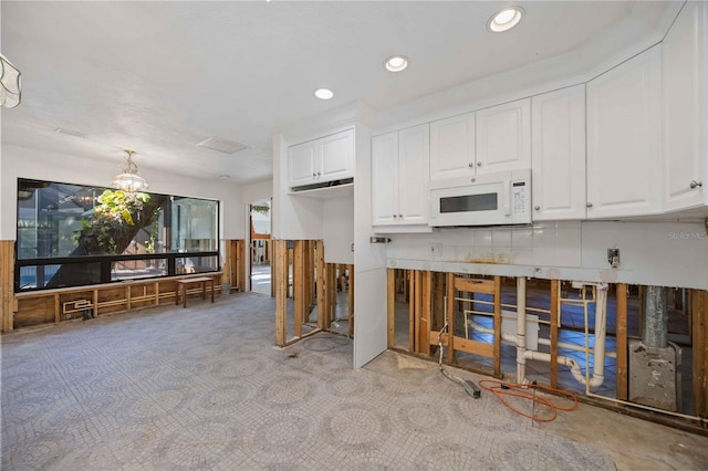 kitchen featuring white cabinets