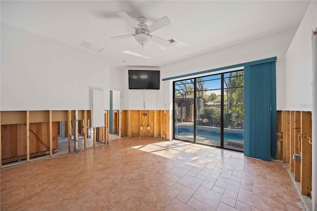 interior space featuring ceiling fan