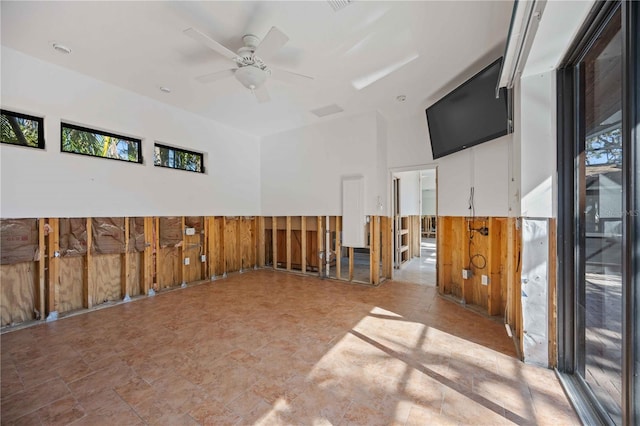 unfurnished room featuring ceiling fan