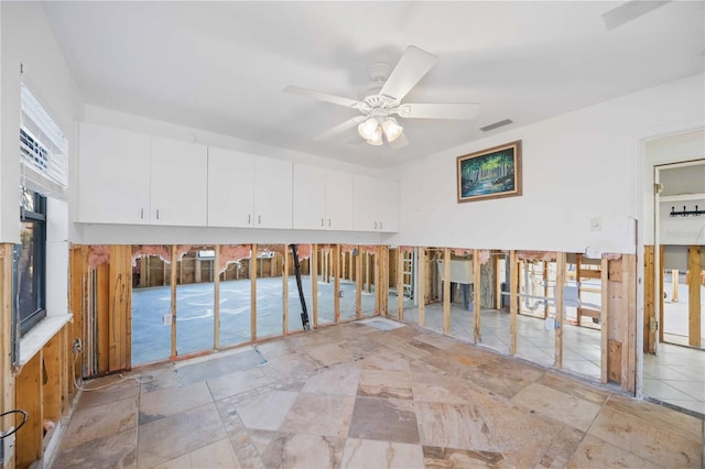 miscellaneous room featuring ceiling fan