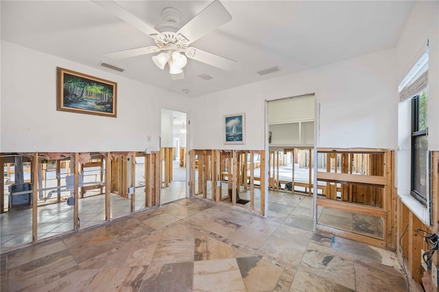 miscellaneous room with ceiling fan