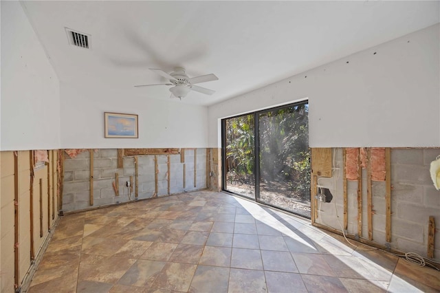 spare room with ceiling fan