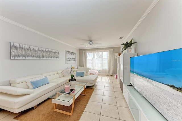 tiled living room with ceiling fan and ornamental molding