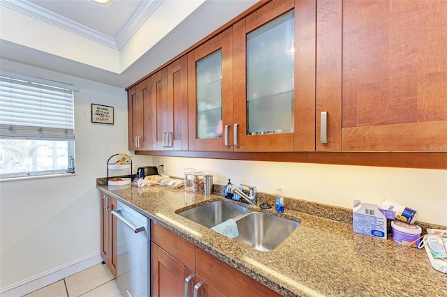 kitchen featuring stainless steel dishwasher, crown molding, sink, light tile patterned floors, and stone counters