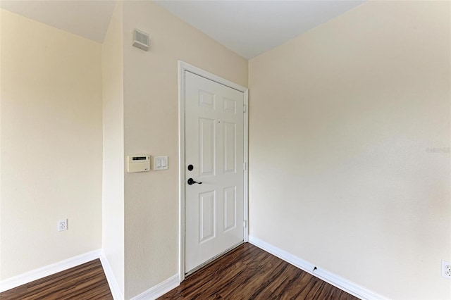 interior space with dark wood-type flooring