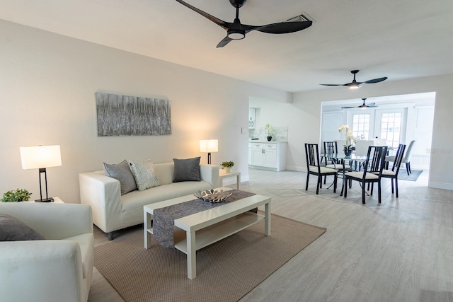 living room with light wood-type flooring