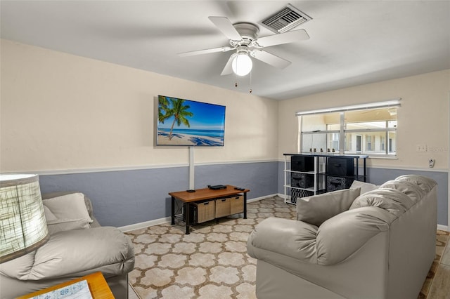 living room with ceiling fan