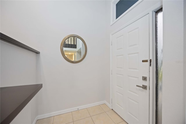 foyer with light tile patterned flooring