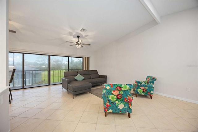 living room with vaulted ceiling with beams, ceiling fan, and light tile patterned flooring