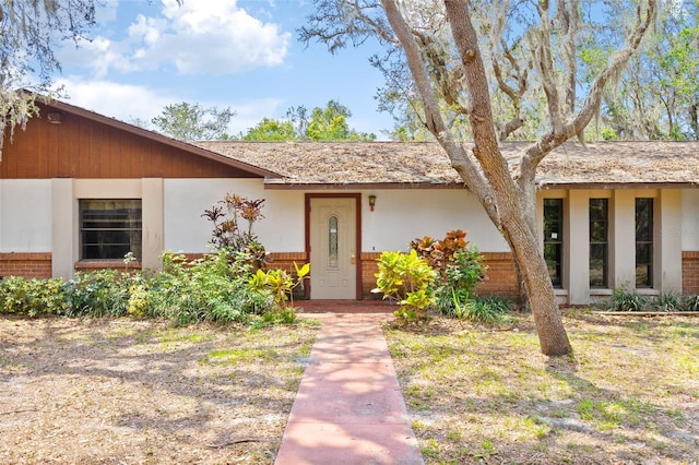 2807 Country River Dr, Parrish, FL 34219 - view of front of home featuring brick siding and stucco siding