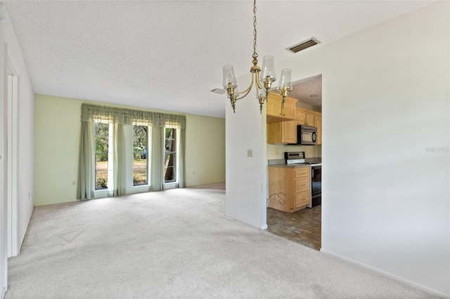 2807 Country River Dr, Parrish, FL 34219 - unfurnished room featuring light colored carpet and a chandelier