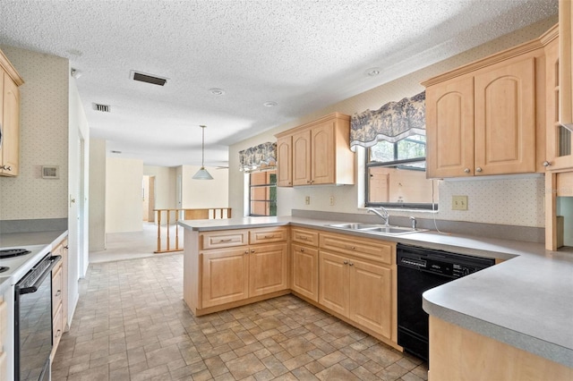 2807 Country River Dr, Parrish, FL 34219 - kitchen with light brown cabinets, dishwasher, wallpapered walls, a peninsula, and a sink