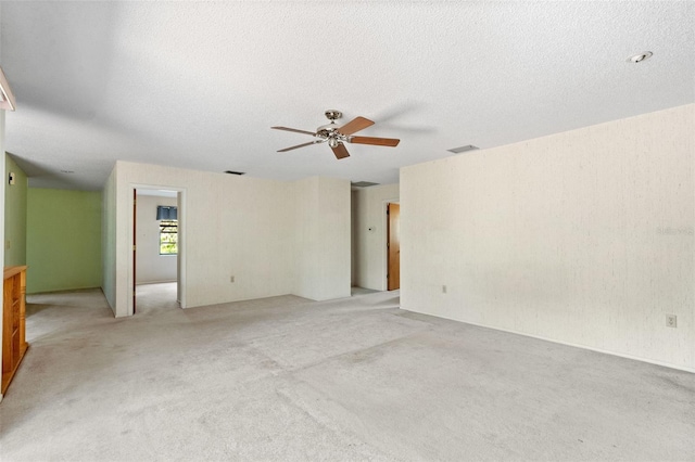 2807 Country River Dr, Parrish, FL 34219 - unfurnished room with ceiling fan, light carpet, and a textured ceiling