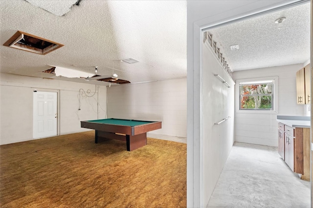 rec room featuring a textured ceiling, billiards, and light carpet